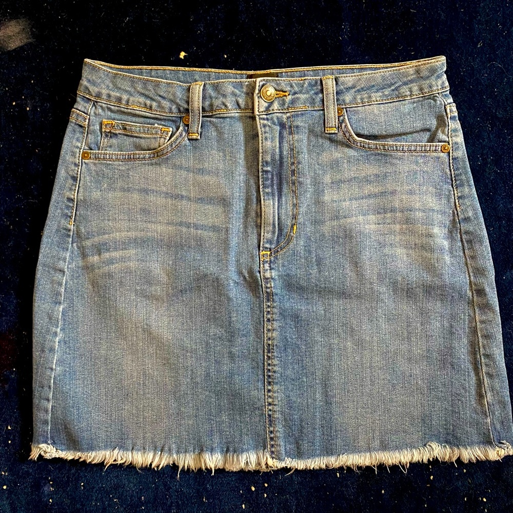 JustBlack denim skirt with raw hem. Mid to light wash. Size L.